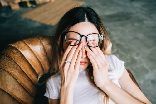 young-woman-rubs-her-eyes-after-using-glasses-eye-2022-02-16-17-25-57-utc.jpg